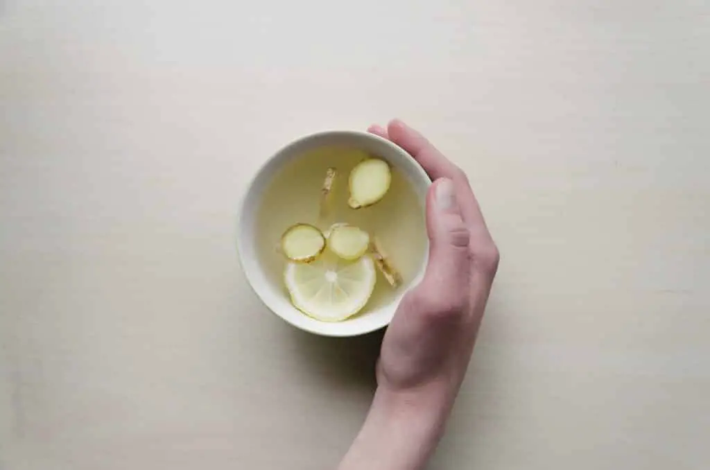A cup of tea demonstrating how to mince ginger